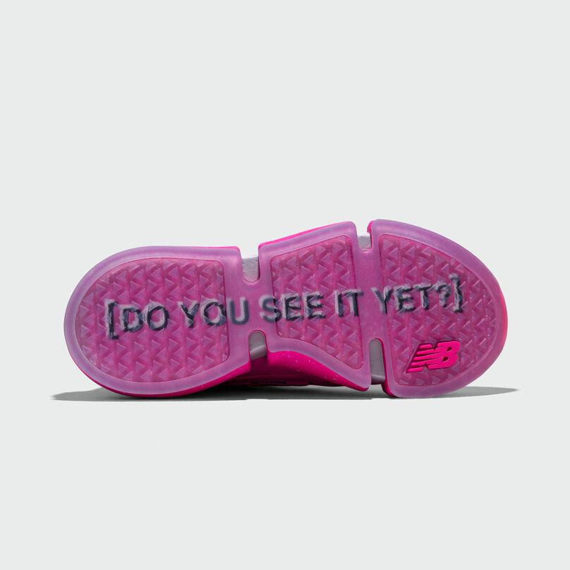 Underside of pink Vision Racer shoe showing the text “Do you see it yet” embedded into it’s sole.