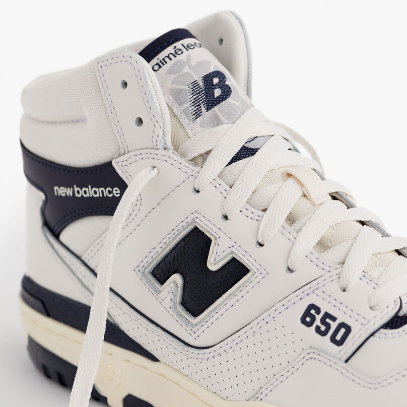 Close up shot of navy blue and white 650 shoe