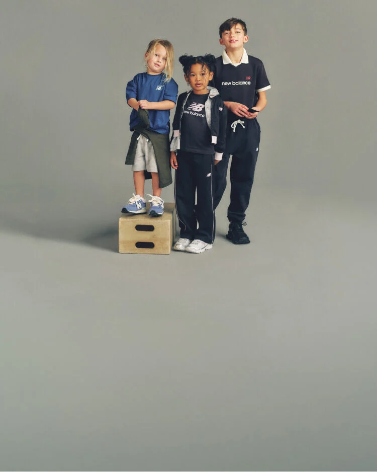 Three kids wearing head to toe New Balance