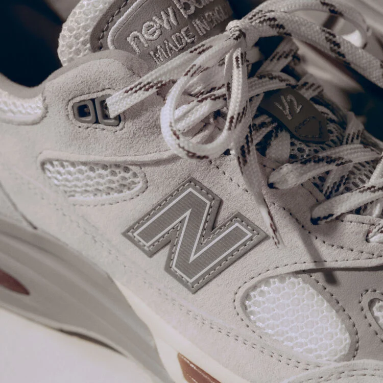 A close-up detailed view of a pair of New Balance Made in UK sneakers. 
