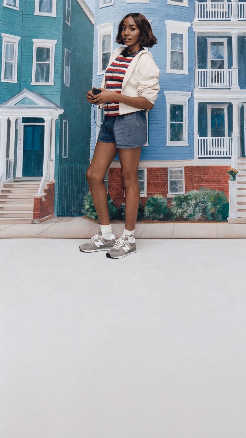 Ayo Edebiri wearing New Balance in a studio. 