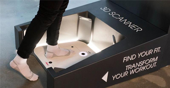 person trying the 3d foot scanner in store